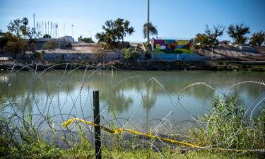 Razor wire lines the area near the Rio Grande on November 19