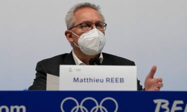 Court of Arbitration for Sport (CAS) director general Matthieu Reeb speaks during a press comference at the 2022 Winter Olympics on Feb. 14