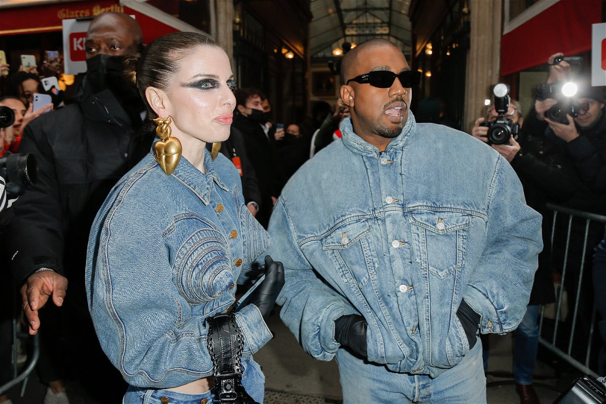 <i>J M Haederick/SIPA/Shutterstock</i><br/>Julia Fox and Kanye West are pictured during Paris Fashion Week in January.