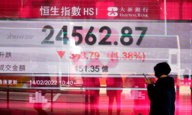 Global stocks slide as fears of Russian invasion grow. Pictured is the Hong Kong Stock Exchange Monday