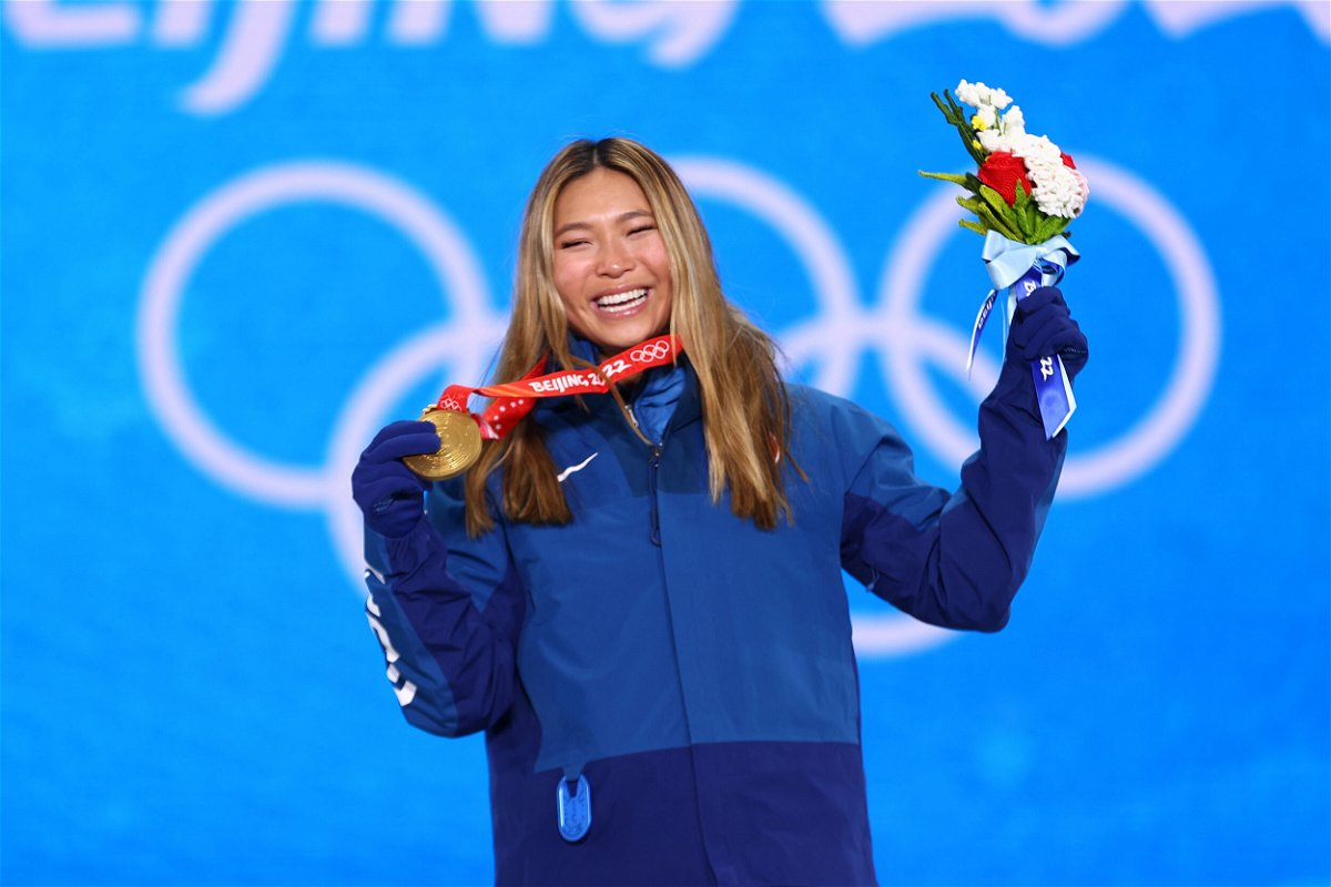 <i>Cameron Spencer/Getty Images</i><br/>Chloe Kim poses with her medal after winning the women's snowboard halfpipe event.