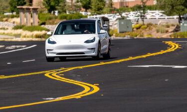 Tesla owners complain about 'phantom braking.' A Tesla Model 3 here travels on a road in Rocklin