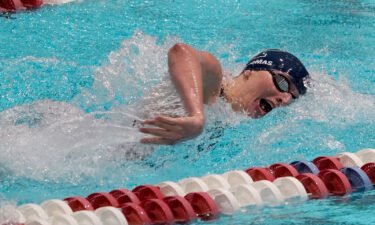 Lia Thomas swims in a qualifying heat of the 100-yard freestyle at the Ivy League Women's Swimming and Diving Championships at Harvard University