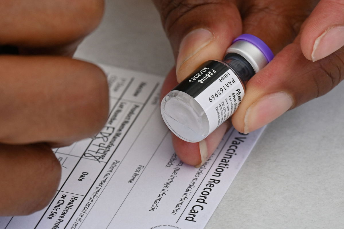 <i>Robyn Beck/AFP/Getty Images</i><br/>Don't fret if you've lost your vaccine card. There are multiple options for replacing the important document.