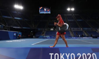 Naomi Osaka of Team Japan leaves the court after losing her Women's Singles Third Round match against Marketa Vondrousova of Team Czech Republic at the Tokyo 2020 Olympic Games.