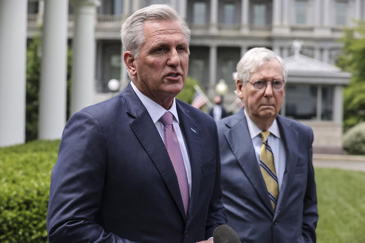 <i>Oliver Contreras/Sipa/Bloomberg/Getty Images</i><br/>U.S. House Minority Leader Kevin McCarthy (left) speaks to members of the media as Senate Minority Leader Mitch McConnell (right) listens after a meeting with President Joe Biden at the White House on Wednesday