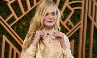 Elle Fanning arrives at the 28th annual Screen Actors Guild Awards at the Barker Hangar on Sunday