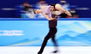 Madison Hubbell and Zachary Donohue of the US skate during the Beijing Winter Olympics Games.