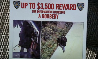 NYPD presented a reward flyer during a news conference.