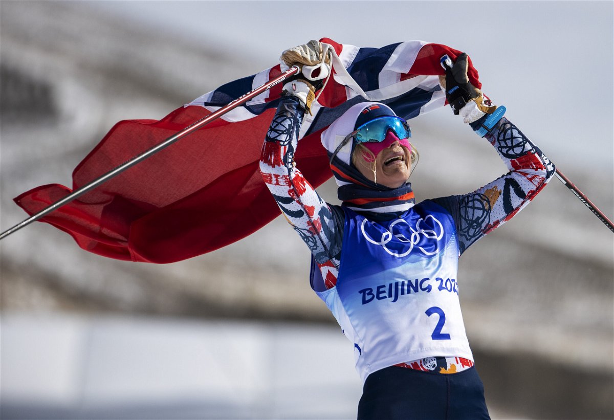 <i>Al Bello/Getty Images</i><br/>Therese Johaug of Team Norway celebrates winning gold during the Women's Cross-Country Skiing 30k Mass Start Free on Day 16 of the Beijing 2022 Winter Olympics on February 20