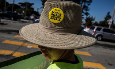 Roger Wong is seen wearing a pin in support of the San Francisco School Board recall during a rally in the Sunset District of San Francisco on Saturday