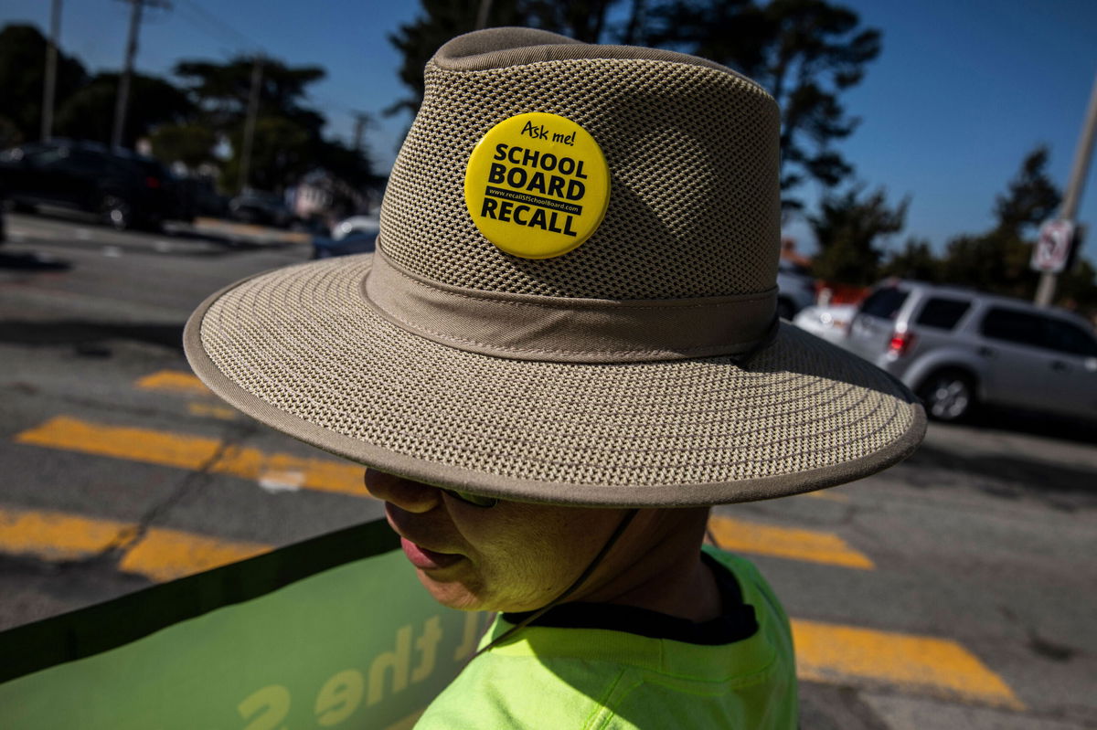 <i>Stephen Lam/The San Francisco Chronicle/Getty Images</i><br/>Roger Wong is seen wearing a pin in support of the San Francisco School Board recall during a rally in the Sunset District of San Francisco on Saturday