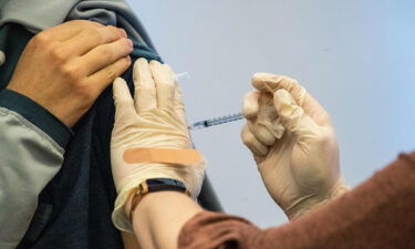 The pace of people getting Covid-19 vaccine booster shots in the United States has reached a new low