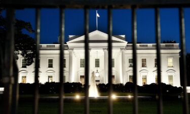 The White House is seen at dusk on the eve of a possible government shutdown as Congress battles out the budget in Washington