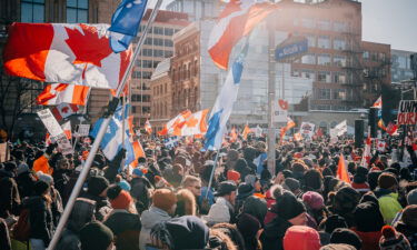 People gather in the street