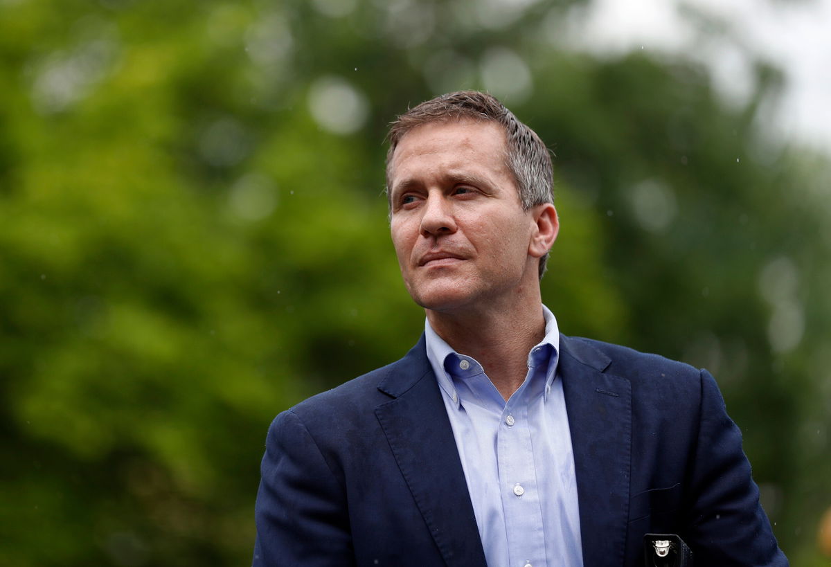 <i>Jeff Roberson/AP</i><br/>Then-Missouri Gov. Eric Greitens waits to deliver remarks near the capitol in Jefferson City in this May 17