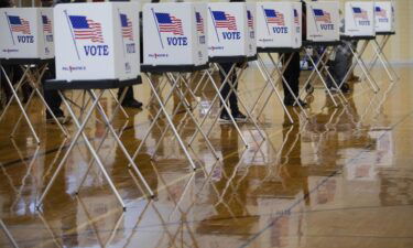 Voters cast ballots at a polling location in Southfield