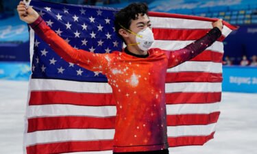 Nathan Chen celebrates after winning the gold medal in the men's free skate program.