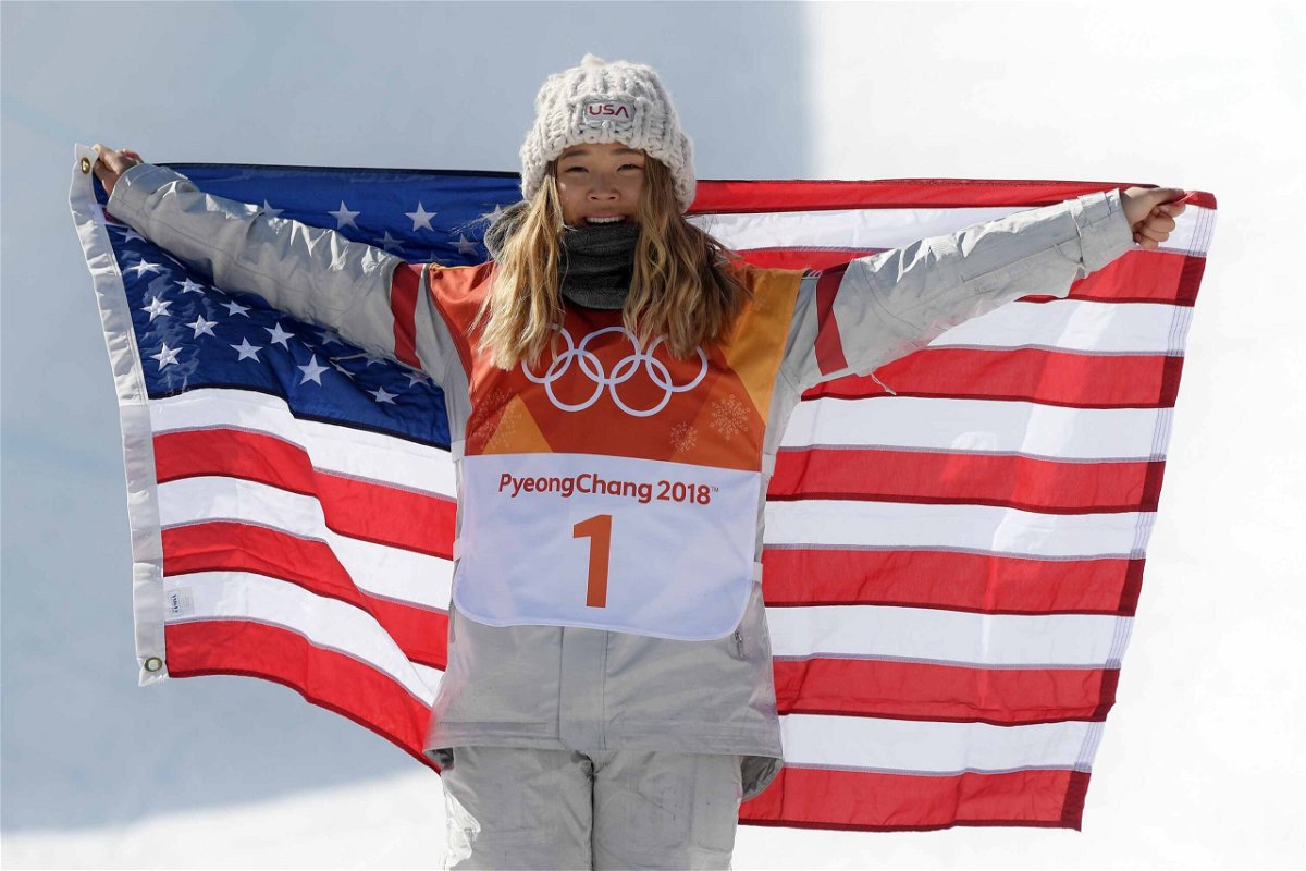 <i>David Ramos/Getty Images</i><br/>Chloe Kim of the United States celebrates during the victory ceremony after the halfpipe final.