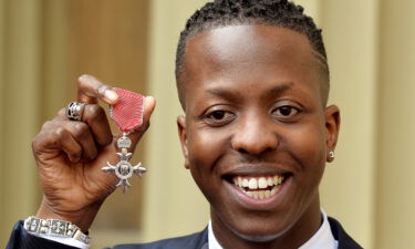 Jamal Edwards holds his Member of the British Empire (MBE)