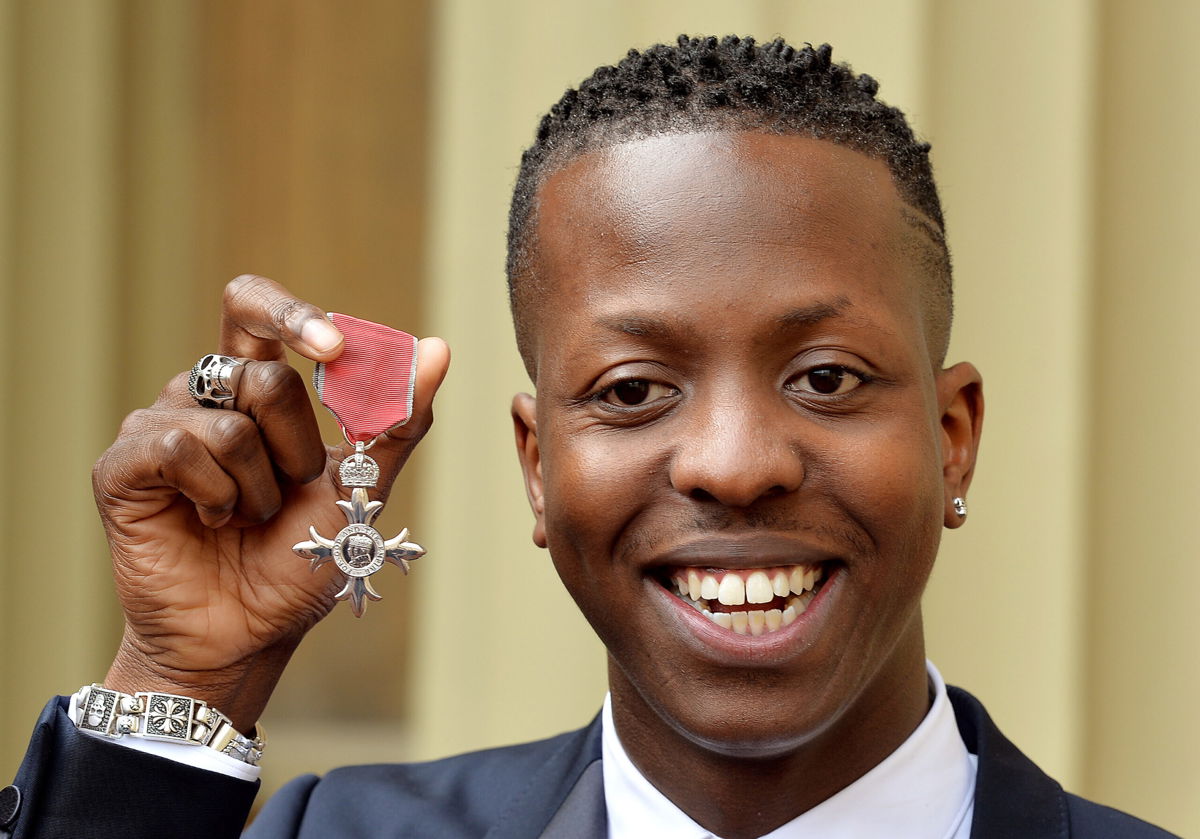 <i>John Stillwell/Getty Images</i><br/>Jamal Edwards holds his Member of the British Empire (MBE)