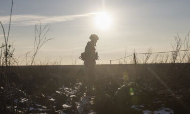 Experts are speculating over Russia's next move. They may want to check Ukraine's weather forecast. Pictured is an Ukrainian soldier in Mariupol