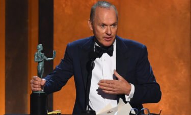 Actor Michael Keaton accepts the award for outstanding performance by a male actor in a television movie or limited series onstage during the 28th Annual Screen Actors Guild (SAG) Awards at the Barker Hangar in Santa Monica