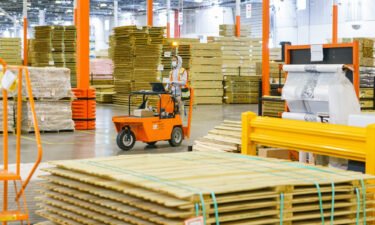 An employee works inside the Home Depot flatbed distribution center in Stonecrest