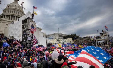 Trump supporters clash with police and security forces as people try to storm the US Capitol on January 6