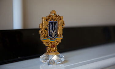 The coat of arms of Ukraine is displayed in Alex Podebryi's home in suburban Atlanta.