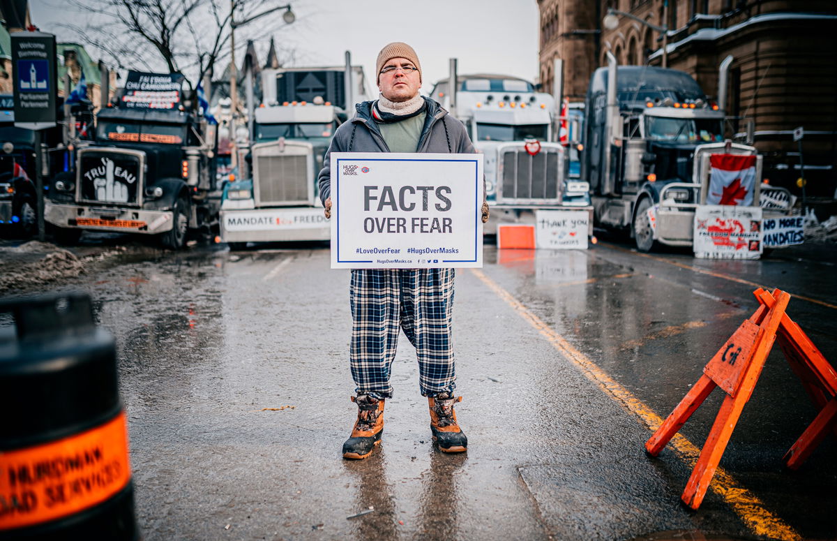 <i>Olga Samotoy/SPTNK/AP</i><br/>A man takes part in the Freedom Convoy protest over Canadian Covid-19 restrictions in Ottawa on February 2.