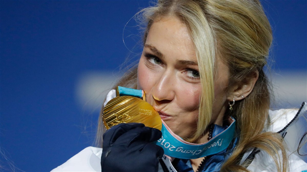 <i>Eric Gaillard/Reuters</i><br/>Mikaela Shiffrin celebrates with her gold medal from the giant slalom in PyeongChang.