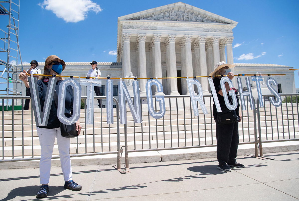 <i>SAUL LOEB/AFP/Getty Images</i><br/>Demonstrators call for Senators to support the elimination of the Senate filibuster in order to pass voting rights legislation and economic relief bills