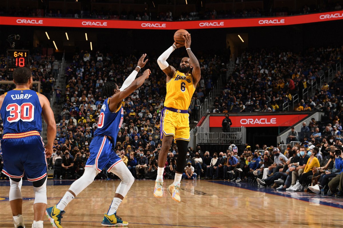 <i>Noah Graham/NBAE/Getty Images</i><br/>LeBron James of the Los Angeles Lakers shoots a 3-pointer in a game against the Golden State Warriors on February 12.