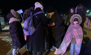 Ukrainian refugees crossing the border into Medyka