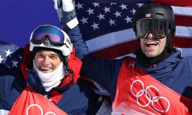 Silver medalist Nicholas Goepper (L) and Gold medalist Alexander Hall of Team United States celebrate after the Men's freestyle slopestyle final on Day 12 of the Beijing 2022 Winter Olympics.