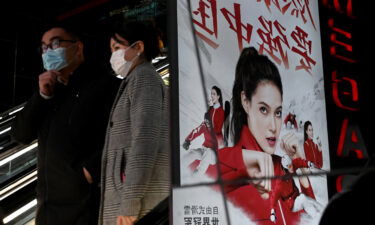 An advertising billboard shows Eileen Gu promoting the Chinese dairy company Mengniu Dairy.