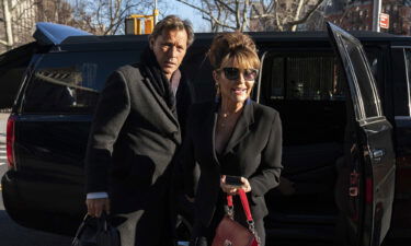 Former Alaska Governor Sarah Palin arrives at federal court with former NHL hockey player Ron Duguay in New York on Friday