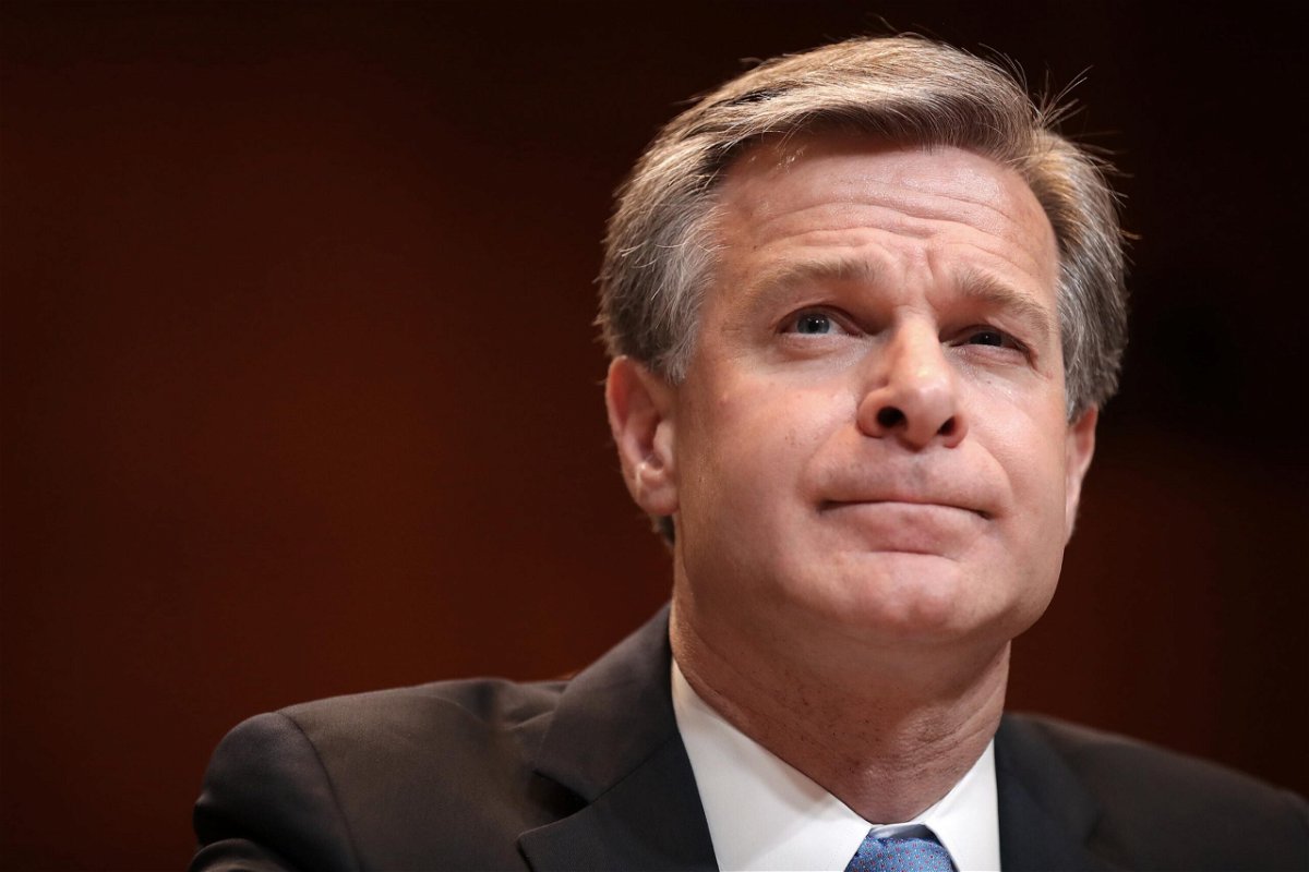 <i>Chip Somodevilla/Getty Images</i><br/>FBI Director Christopher Wray on Monday defended the bureau against right-wing claims that it is pursuing cases against people who participated in the January 6