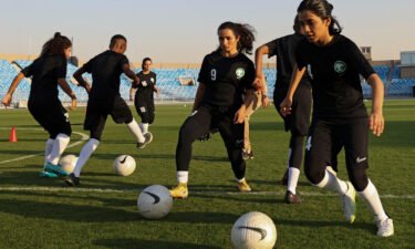 Players of the first Saudi women's football team attend a session in November 2