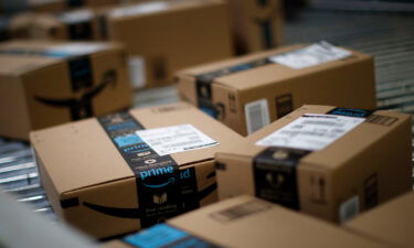 Former Amazon employee is sentenced to federal prison for involvement in a bribery scheme. Boxes move along a conveyor belt at the Amazon.com fulfillment center in Kenosha