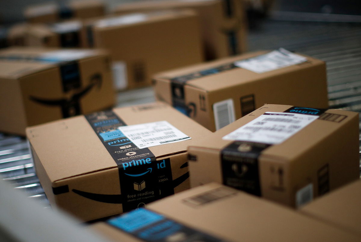 <i>Jim Young/Bloomberg/Getty Images</i><br/>Former Amazon employee is sentenced to federal prison for involvement in a bribery scheme. Boxes move along a conveyor belt at the Amazon.com fulfillment center in Kenosha