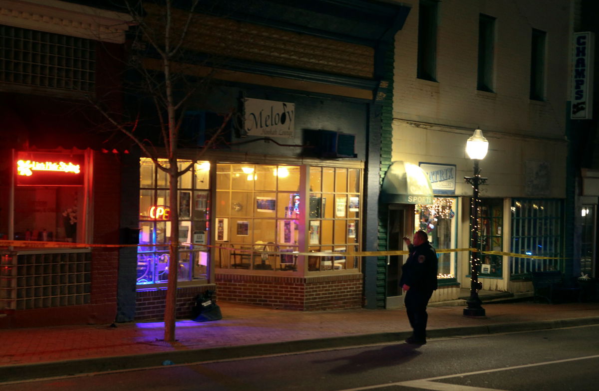 <i>Matt Gentry/The Roanoke Times/AP</i><br/>A police officer stands outside the Melody Hookah Lounge in Blacksburg
