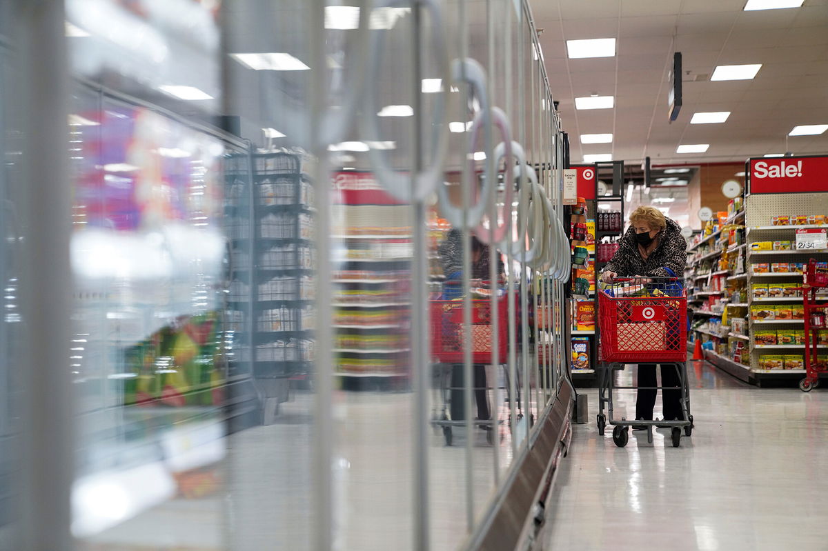 <i>Wang Ying/Xinhua/Getty Images</i><br/>A customer shops at a Target store in New York on January 12. A key measure of inflation climbed to a near-40-year high in January. The consumer price index rose 7.5% in the 12 months ending January