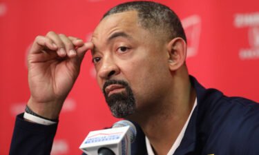 Juwan Howard speaks to the media regarding a fight that broke out on the court after an NCAA college basketball game against Wisconsin.