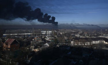 Black smoke rises from a military airport in Chuguyev near Kharkiv  on Thursday.