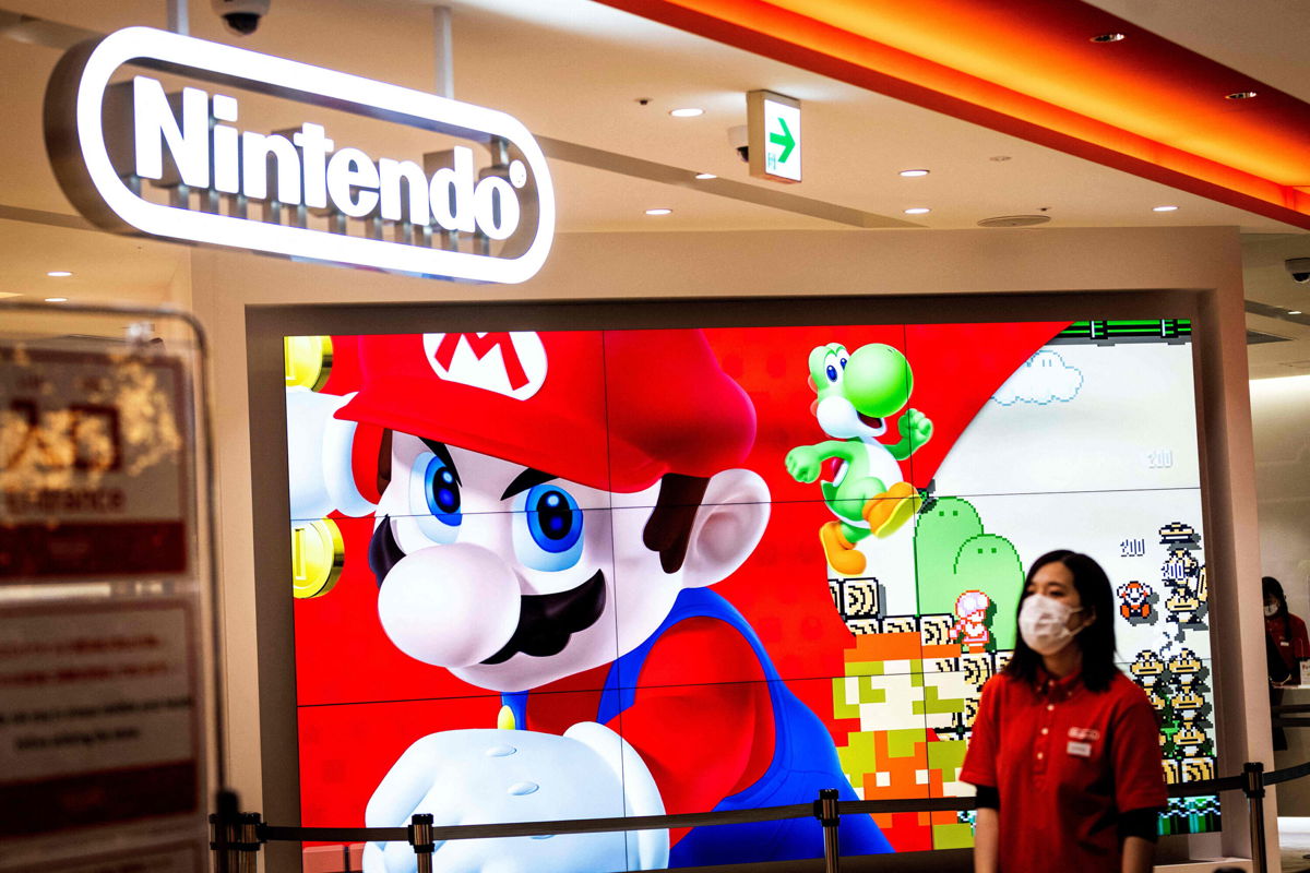 <i>Behrouz Mehri/AFP/Getty Images</i><br/>PlayStation and Switch sales are suffering as the gaming wars heat up. Pictured is a Nintendo store in Tokyo on February 3.