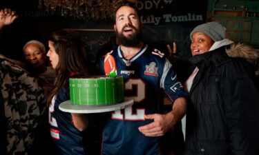 Meir Kay (center) has thrown Super Bowl parties for people experiencing homelessness since 2017. This year is his biggest achievement yet