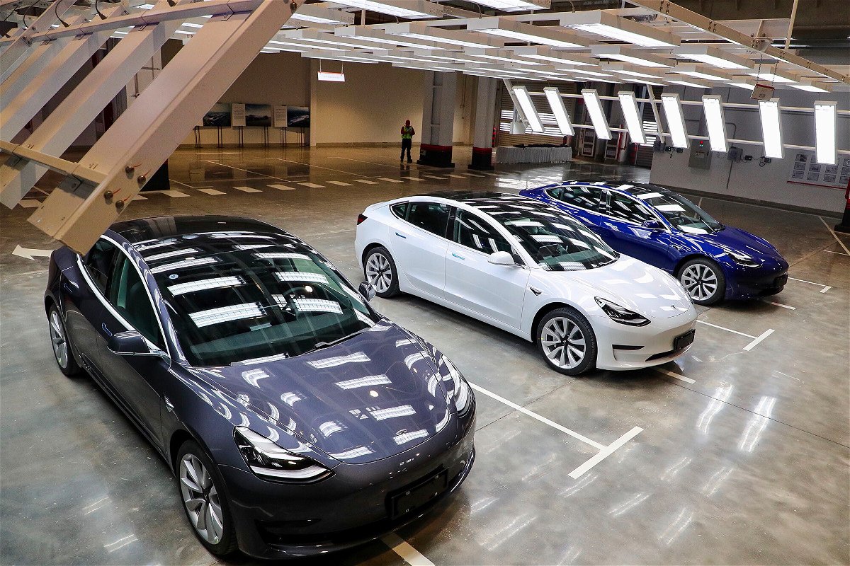 <i>STR/AFP/Getty Images</i><br/>Tesla Model 3 cars are displayed during the Tesla China-made Model 3 Delivery Ceremony in Shanghai.