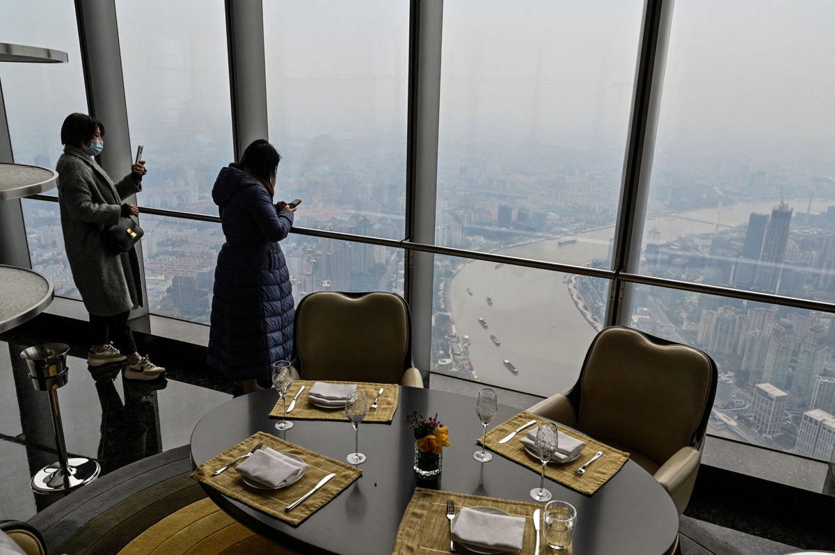 <i>HECTOR RETAMAL/AFP/Getty Images</i><br/>Guests take in the panoramic views from the Heavenly Jin restaurant.